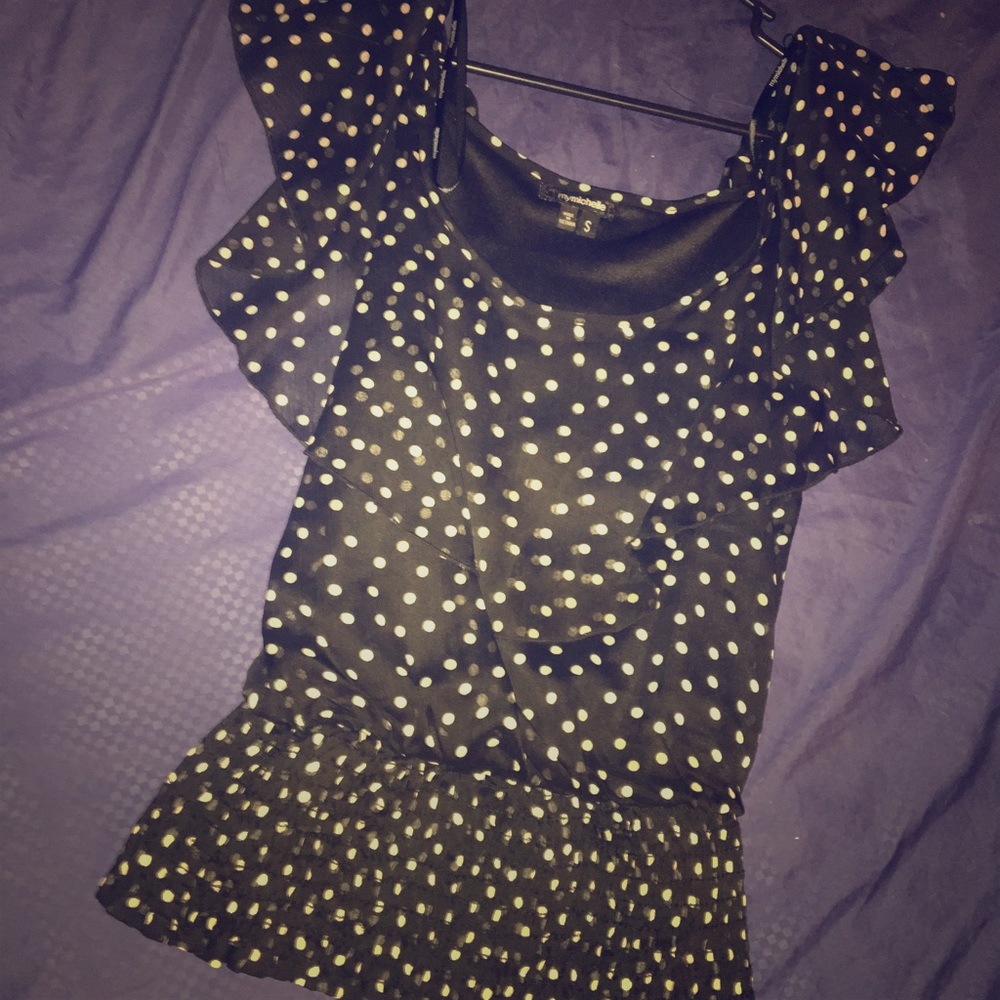 black polka dotted top